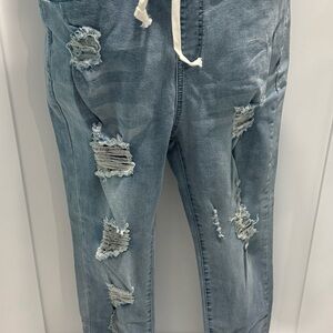 Distressed Cropped Women's Denim Jogger Pants - Light Blue